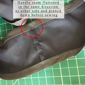 Handle seams flattened with bias tape